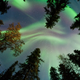 Image for article titled Mesmerizing Aurora in Dramatic Landscapes of Fire, Ice, and Shadow